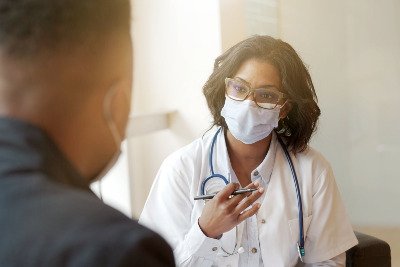 Doctor talking to patient