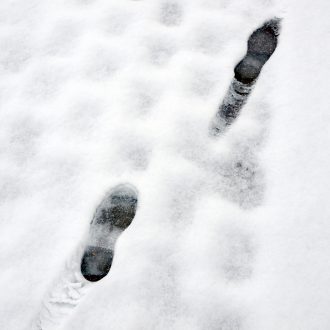 Foot prints in snow.